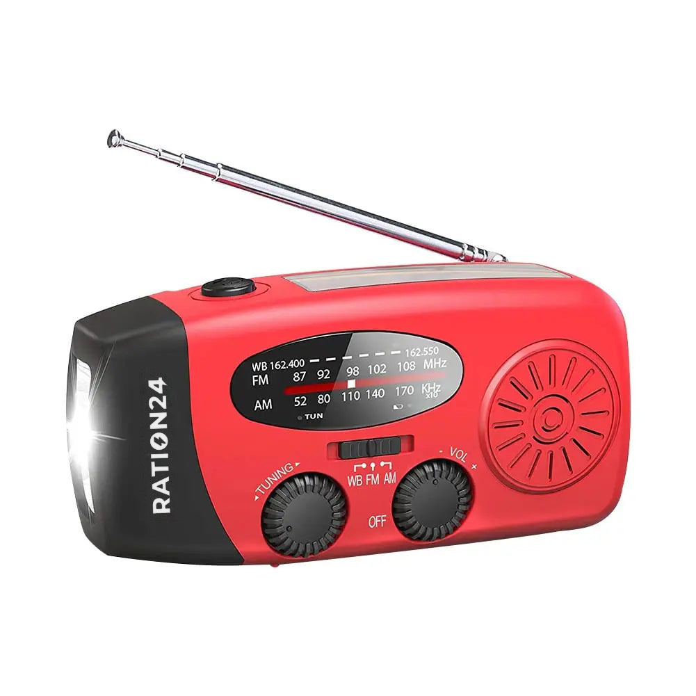 Kurbelradio in Rot mit ausgezogener Antenne und leuchtender Taschenlampe