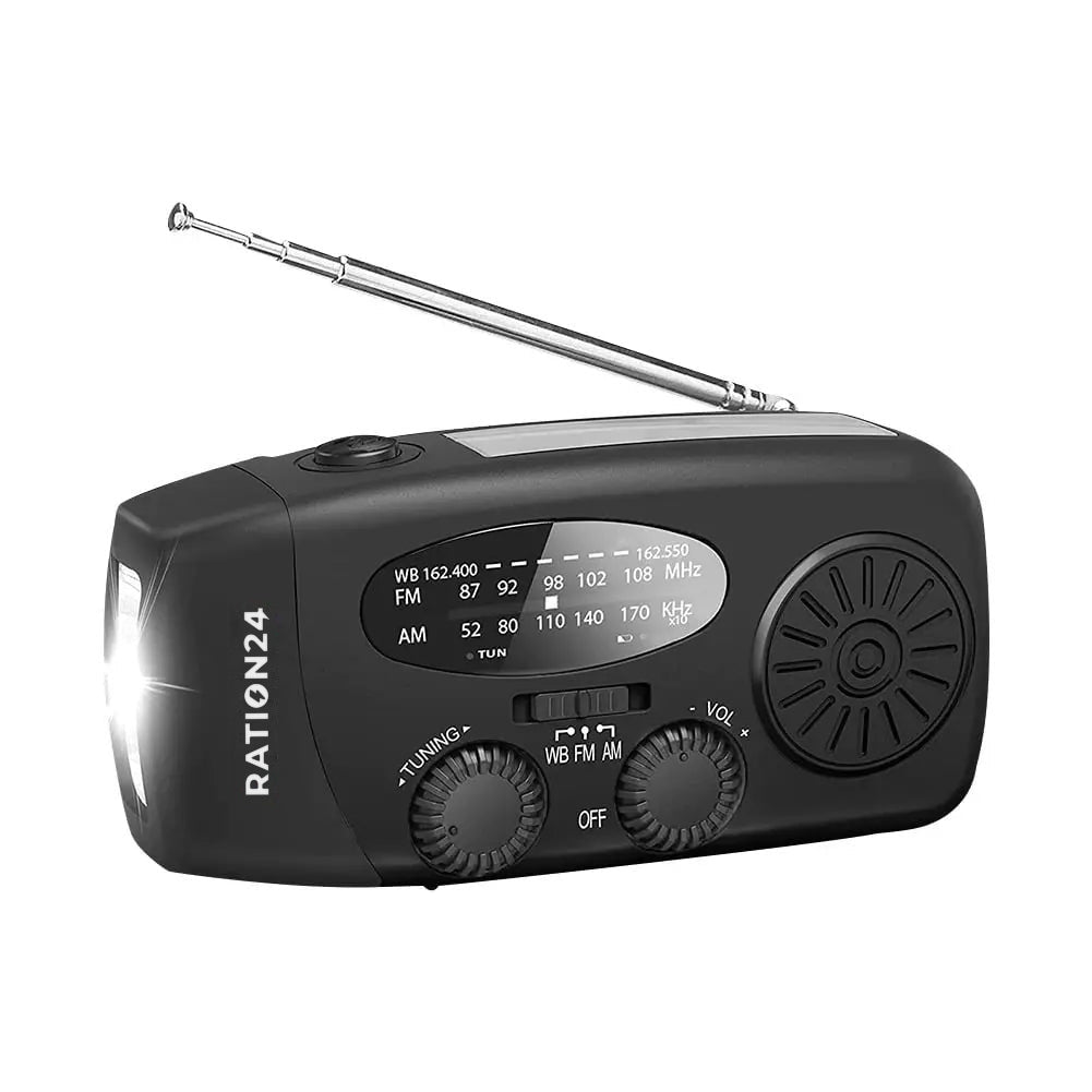 Kurbelradio in Schwarz mit ausgezogener Antenne und leuchtender Taschenlampe